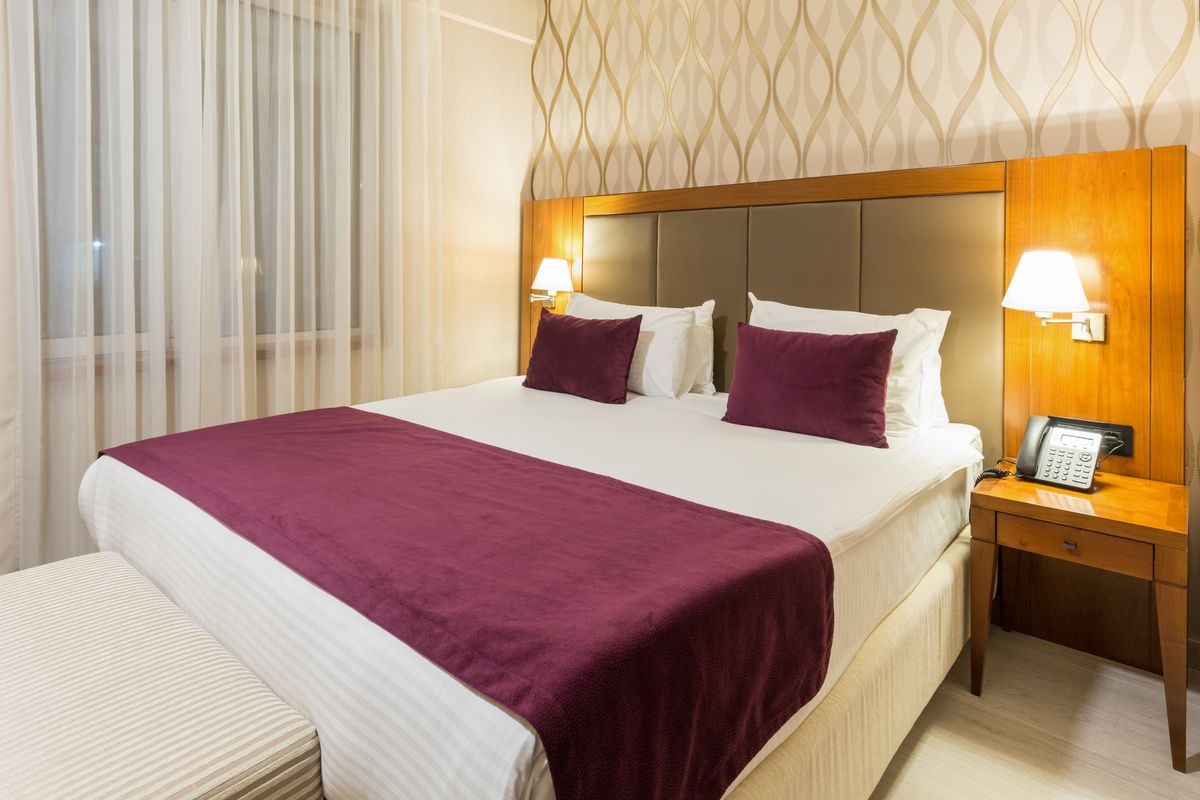 Interior of a hotel bedroom in the evening